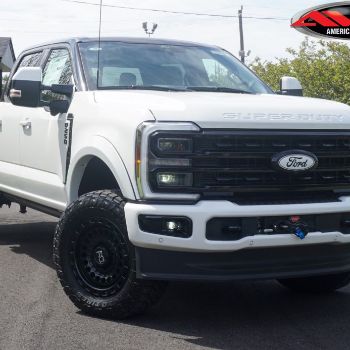 White 2024 Ford F250 with Two Tone Chrome Delete / Blackout on 20" 20x9 Black Rhino Sentinel Wheels & 35" Toyo Open Country A/T III Tires