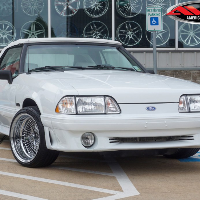 White 1990 Ford Mustang GT Convertible on 17x8 Luxor 100-Spoke Wire Wheels & 215/40R17 Tires