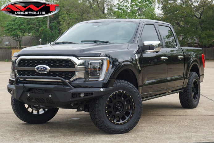 Black 2023 Ford F150 with 2" BDS Level on 20" Method Race MR305 Wheels & 285/65R20 Nitto Recon Grappler Tires