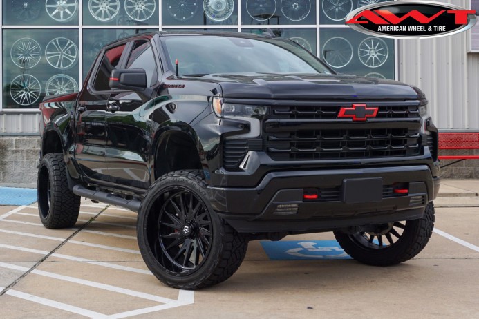 Black 2024 Chevrolet Silverado 1500 RST with 6" Rough Country Lift on 24x12 TIS Offroad 547B Wheels & 35" Nitto Recon Grappler A/T Tires