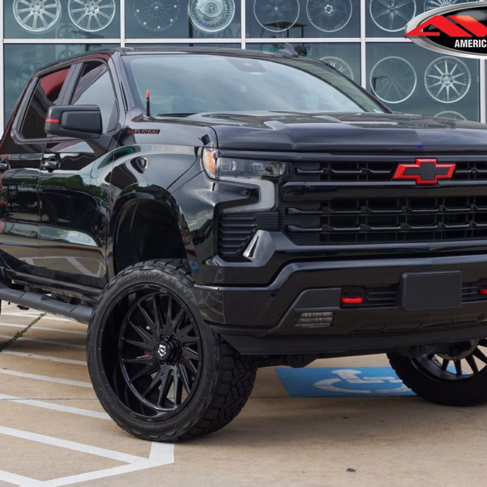Black 2024 Chevrolet Silverado 1500 RST with 6" Rough Country Lift on 24x12 TIS Offroad 547B Wheels & 35" Nitto Recon Grappler A/T Tires