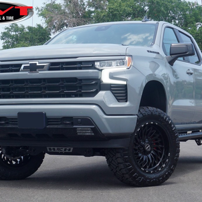 Chrome Delete Gray 2024 Chevrolet Silverado 1500 RST with 6" Rough Country Lift on 20x10 XVR-1 Off-Road Compass Wheels & 35" Nitto Ridge Grappler Tires