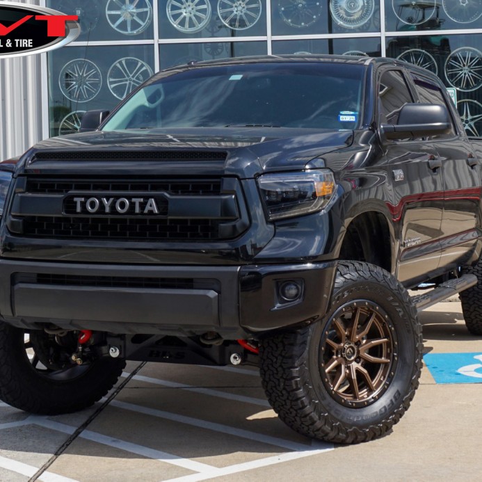 Black 2014 Toyota Tundra with Lift on 20x9 Fuel Off-Road D681 Rebel 5 Wheels in Bronze & 37x12.50R20 BFGoodrich All-Terrain T/A Tires